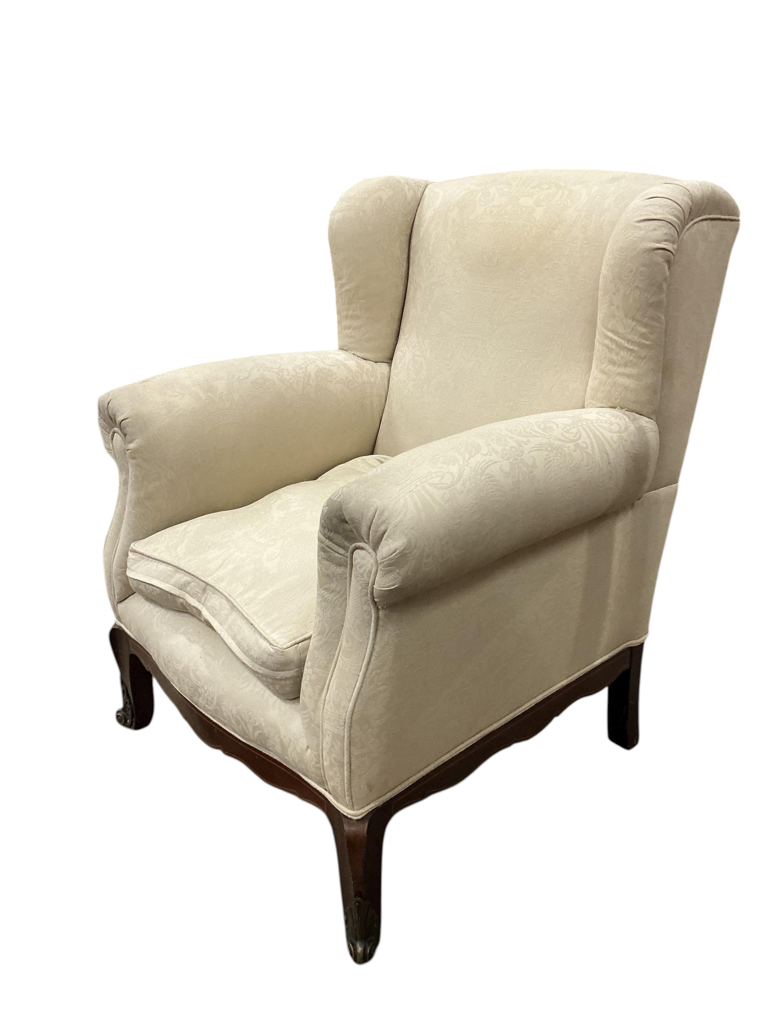 A late 19th century gilt metal mounted upholstered armchair, width 84cm, depth 76cm, height 100cm